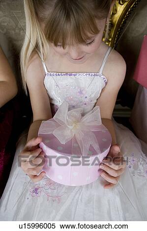 Little girls with birthday presents View Large Photo Image Stock Photography - Little girls with birthday presents. Fotosearch