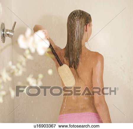 A young woman in a shower View Large Photo Image Stock Photo - A young woman in a shower. Fotosearch