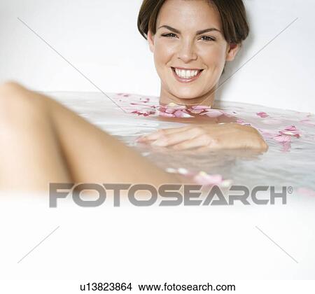 A young woman in a spa bath View Large Photo Image Picture - A young woman in a spa bath. Fotosearch