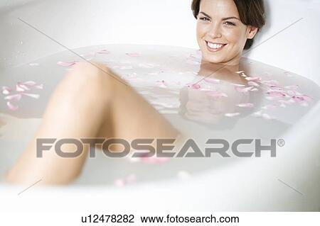 A young woman in a spa bath View Large Photo Image Stock Image - A young woman in a spa bath. Fotosearch