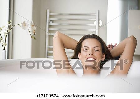 A young woman in the bath View Large Photo Image Picture - A young woman in the bath. Fotosearch