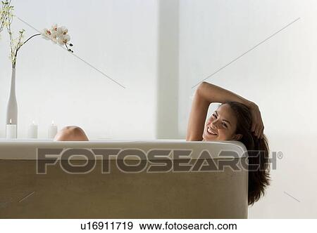 A young woman in the bath View Large Photo Image Stock Photo - A young woman in the bath. Fotosearch