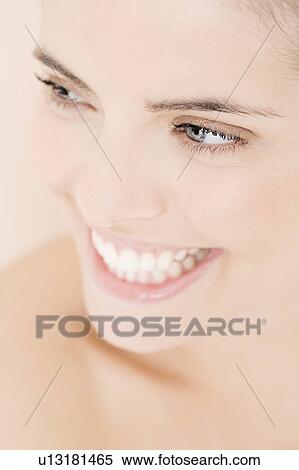 Portrait of young woman smiling View Large Photo Image Stock Photography - Portrait of young woman smiling. Fotosearch