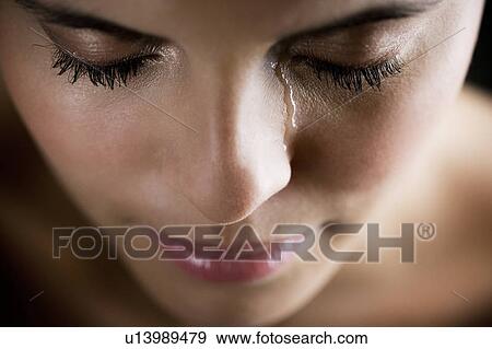 Close up of woman crying View Large Photo Image Stock Photo - Close up of woman crying. Fotosearch