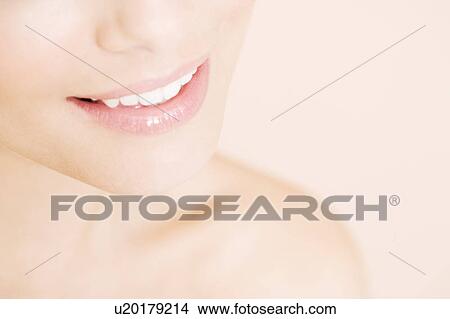 Close-up of young woman's smile View Large Photo Image Picture - Close-up of young woman's smile. Fotosearch