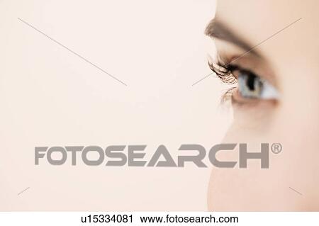 Detail of young woman's face showing right eye View Large Photo Image Stock Image - Detail of young woman's face showing right eye. Fotosearch