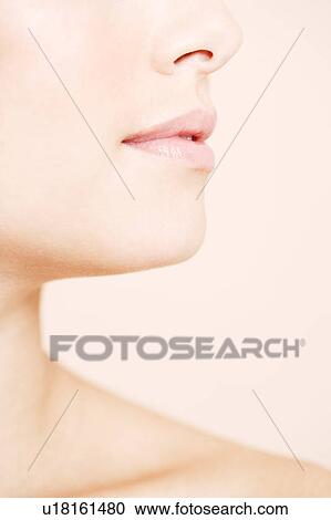 Detail of young woman's face showing mouth and chin in profile View Large Photo Image Stock Image - Detail of young woman's face showing mouth and chin in profile. Fotosearch