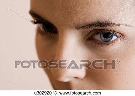 Detail of young woman's face showing eyes View Large Photo Image Stock Image - Detail of young woman's face showing eyes. Fotosearch
