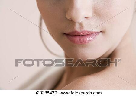 Lower half of a young woman's face View Large Photo Image Stock Photo - Lower half of a young woman's face. Fotosearch