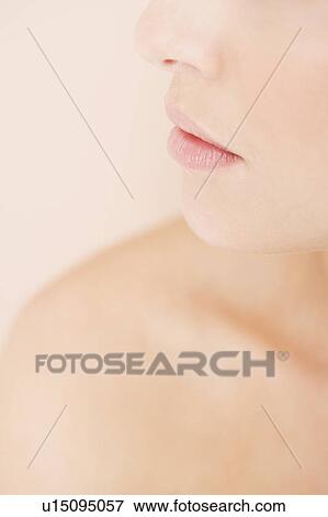 Young woman, close-up of mouth View Large Photo Image Stock Photo - Young woman, close-up of mouth. Fotosearch