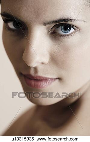 Close-up young woman's face View Large Photo Image Stock Photography - Close-up young woman's face. Fotosearch