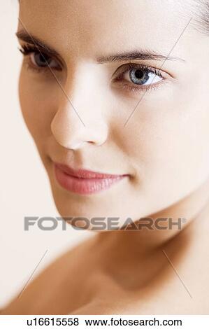 Portrait of a young woman View Large Photo Image Stock Photo - Portrait of a young woman. Fotosearch