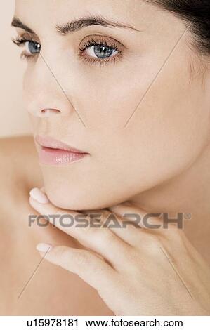 Stock Image - Portrait of young woman. Fotosearch
