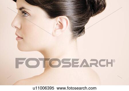 Young woman's face in profile View Large Photo Image Stock Photography - Young woman's face in profile. Fotosearch