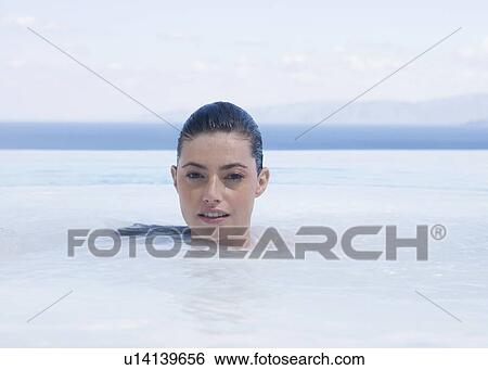 A woman relaxing in a jacuzzi View Large Photo Image Stock Photograph - A woman relaxing in a jacuzzi. Fotosearch