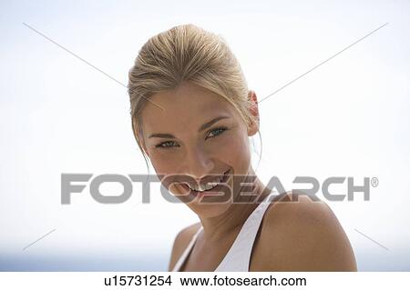 Portrait of a young woman View Large Photo Image Picture - Portrait of a young woman. Fotosearch