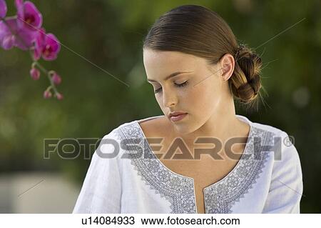 Portrait of a young woman View Large Photo Image Stock Image - Portrait of a young woman. Fotosearch