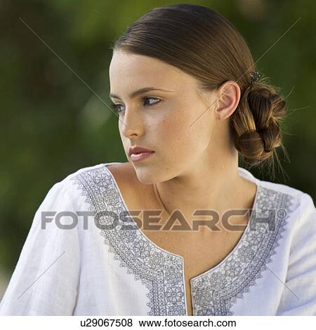Stock Photo - Portrait of a young woman. Fotosearch
