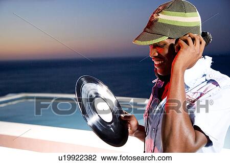 DJ selecting next record View Large Photo Image Stock Image - DJ selecting next record. Fotosearch