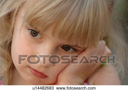 Blonde girl frowning View Large Photo Image Stock Image - Blonde girl frowning. Fotosearch