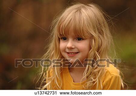 Close up of blond girl’s face View Large Photo Image Stock Image - Close up of blond girl’s face. Fotosearch