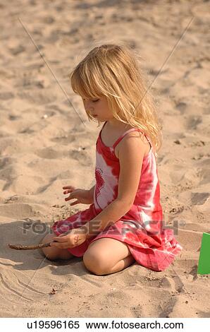 Playing in the Sand View Large Photo Image Stock Photography - Playing in the Sand. Fotosearch