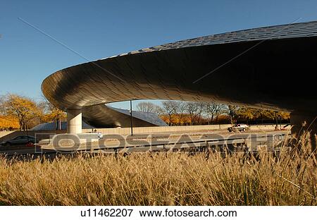 Stock Photo - An enclosed flyover at Millennium Park in Chicago. Fotosearch