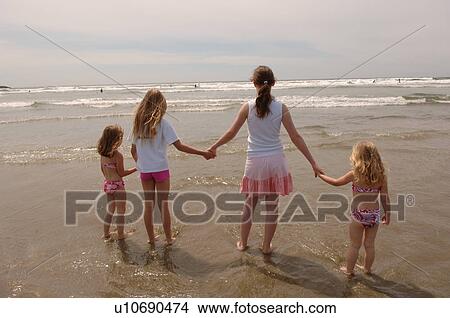 Children on beach View Large Photo Image Picture - Children on beach. Fotosearch
