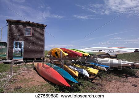 Kayaks outside a wooden cabin in Prince Edward Island, Canada View Large Photo Image Stock Image - Kayaks outside a wooden cabin in Prince Edward Island, Canada. Fotosearch