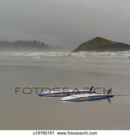 Stock Image - Two surfboards on beach. Fotosearch