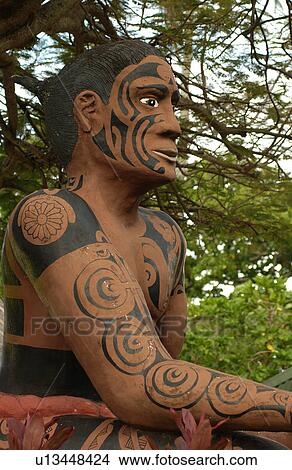 Close-up of a life-size statue of a native woman, Moorea, Tahiti, French Polynesia, South Pacific View Large Photo Image Picture - Close-up of a life-size statue of a native woman, Moorea, Tahiti, French Polynesia, South Pacific. Fotosearch