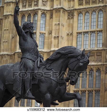 Statue of a human riding a horse in London, England View Large Photo Image Stock Image - Statue of a human riding a horse in London, England. Fotosearch