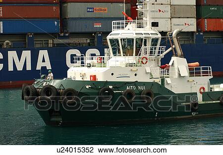 Stock Image - A boat near a ship. Fotosearch