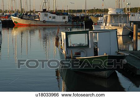 Stock Photograph - Boat in Harbor. Fotosearch