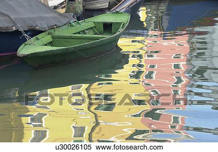 Stock Photography - Boats on a canal in Venice, Burano, Italy. Fotosearch