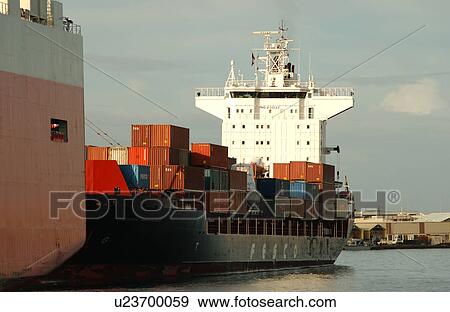 Stock Photo - Containers loaded on a ship. Fotosearch