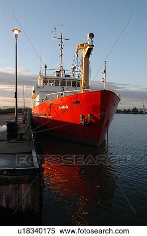 Ship docked at a harbor View Large Photo Image Stock Photography - Ship docked at a harbor. Fotosearch