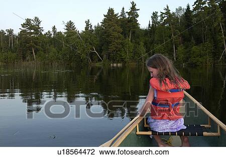 Child in Canoe on Lake View Large Photo Image Stock Image - Child in Canoe on Lake. Fotosearch