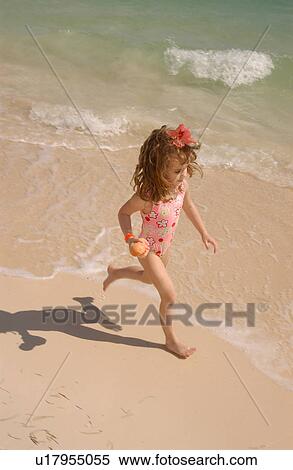 Girl Running on the Beach View Large Photo Image Stock Photography - Girl Running on the Beach. Fotosearch