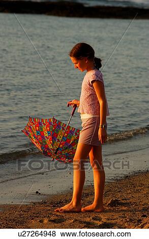 Kids playing on beach View Large Photo Image Stock Photo - Kids playing on beach. Fotosearch