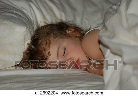 Picture - Little Girl Sleeping. Fotosearch