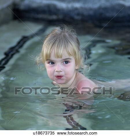 Stock Photography - Young Girl in Swimming Pool. Fotosearch