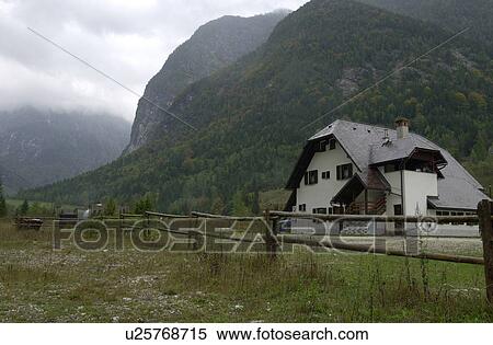 Stock Photography - Country house in the wilderness in Slovenia. Fotosearch