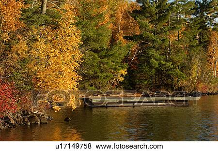 Stock Photo - Lake and Trees in Autumn Colors. Fotosearch
