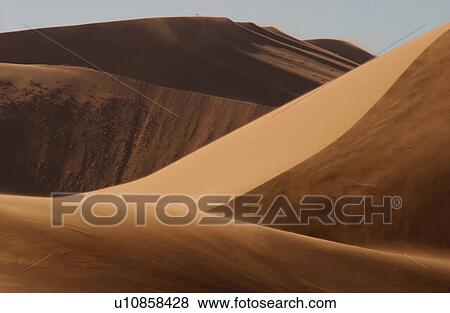 Stock Photo - Sand Dunes of Sossusvlei - Namib desert, Namibia. Fotosearch