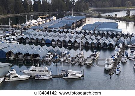 Stock Image - Boats at Vancouver Yacht Club harbour. Fotosearch