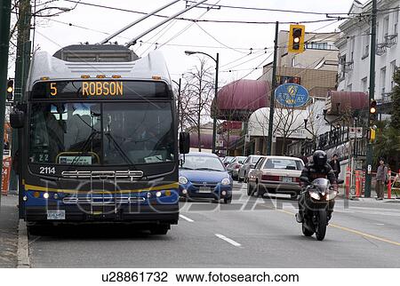 Bus andTraffic downtown Vancouver View Large Photo Image Stock Image - Bus andTraffic downtown Vancouver. Fotosearch