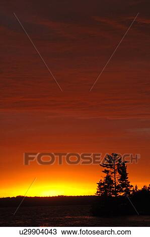 Crimson sunset over Lake of the Woods View Large Photo Image Stock Image - Crimson sunset over Lake of the Woods. Fotosearch