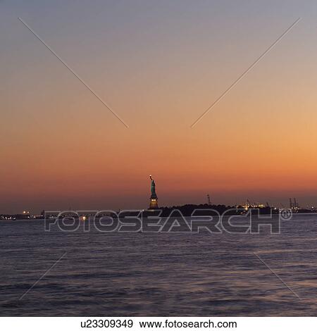 Statue of Liberty against twilight sky, New York City View Large Photo Image Stock Photo - Statue of Liberty against twilight sky, New York City. Fotosearch