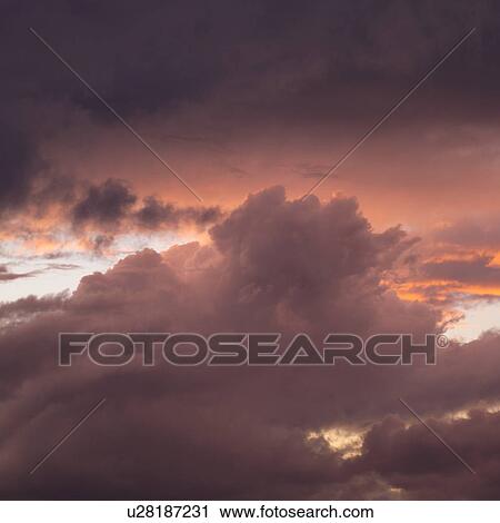 Stock Image - Storm clouds in the sky. Fotosearch